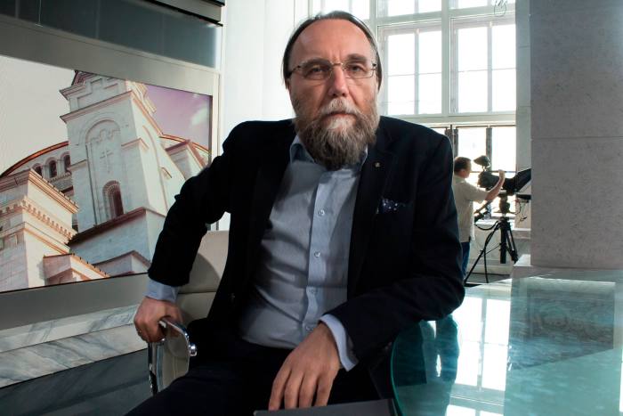 Alexander Dugin, the neo-Eurasianist ideologue, sits in his TV studio in central Moscow, Russia