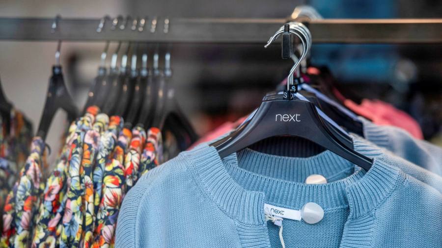 Next pushes up profit forecast as shoppers return to stores