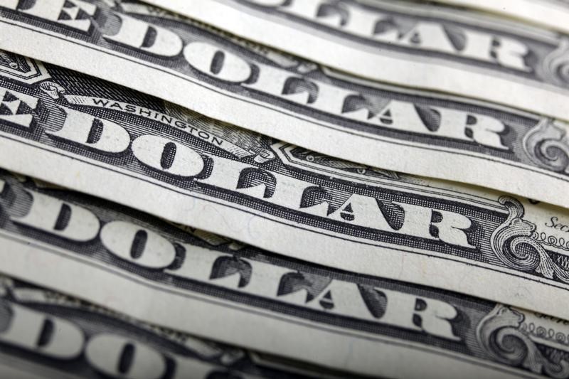 Dollar Edges Lower; Traders Look for Pivot at Fed Meeting