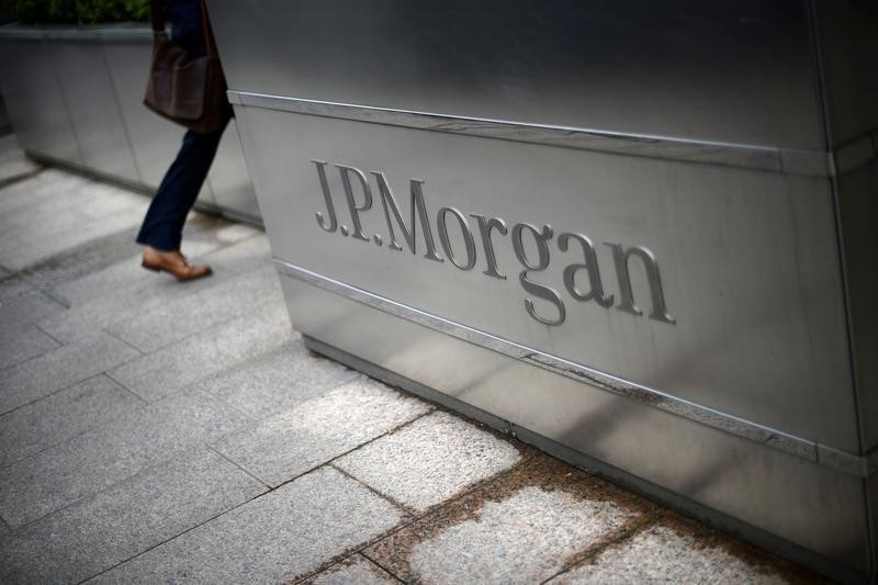 JPMorgan sets aside $1.4 billion for sour loans, profit beats estimates By Reuters